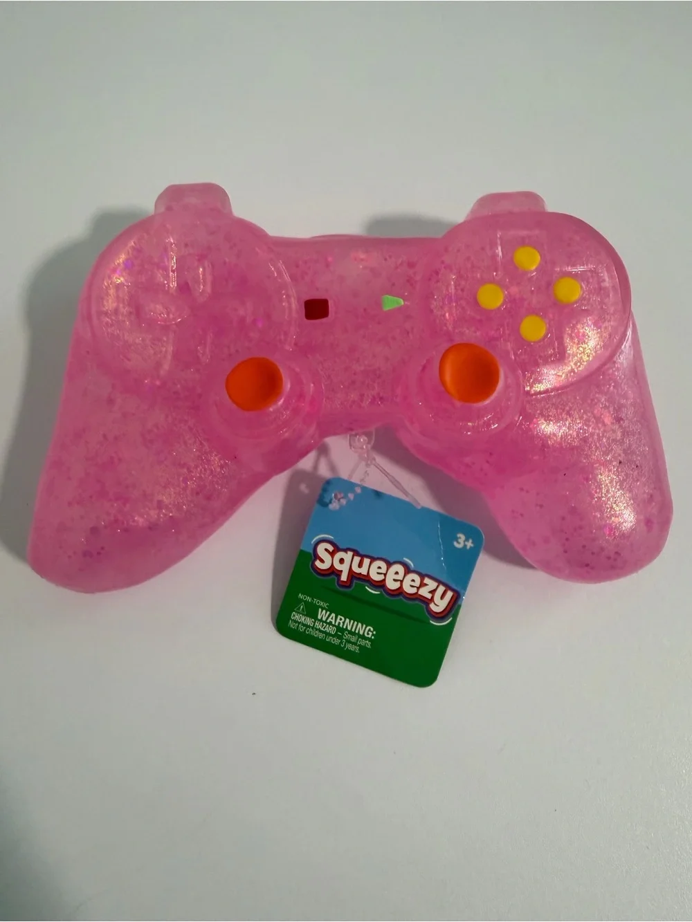 Squeeezy squishy game controller by Toymendous New pink fidget toy